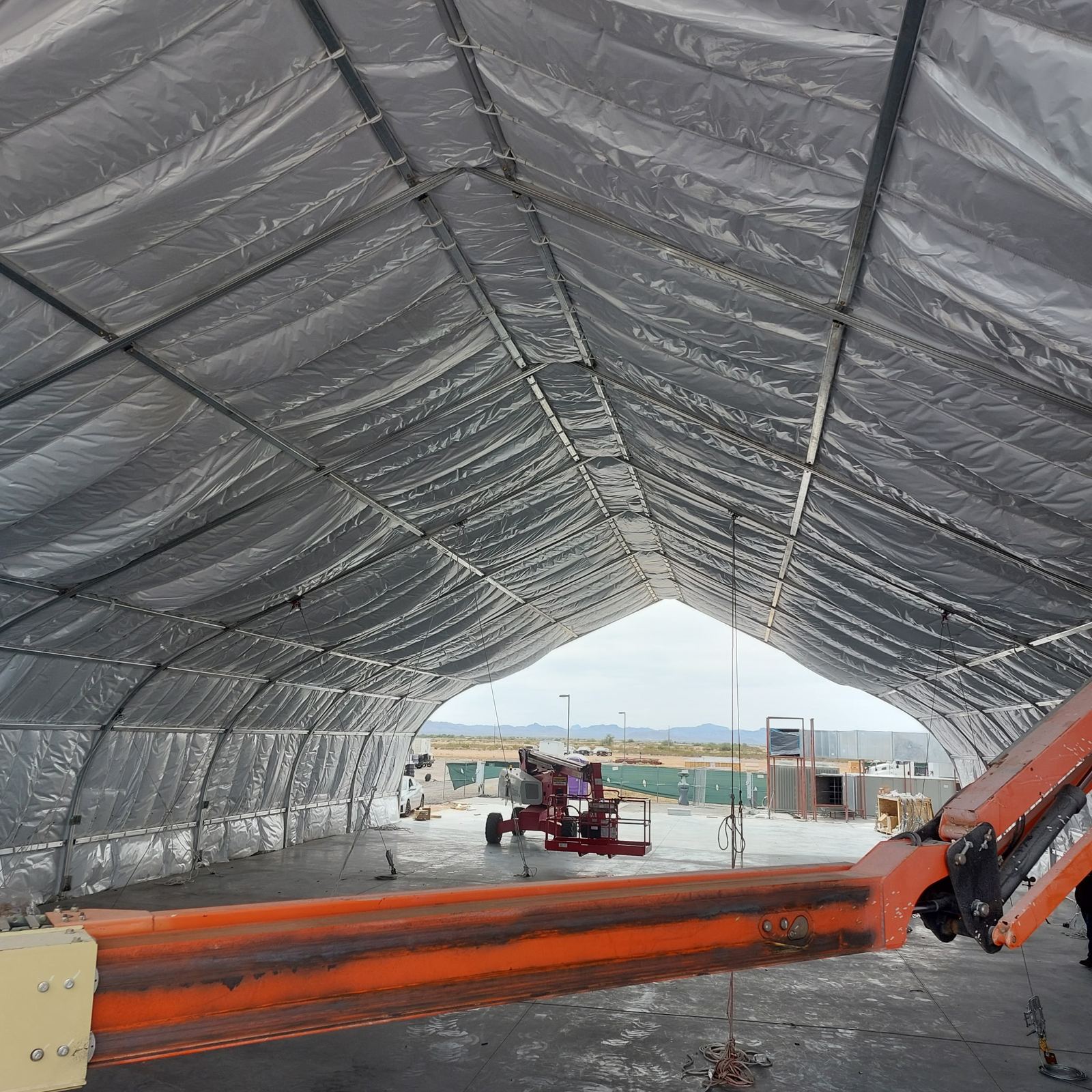 Interior of a large clearspan structure under installation
