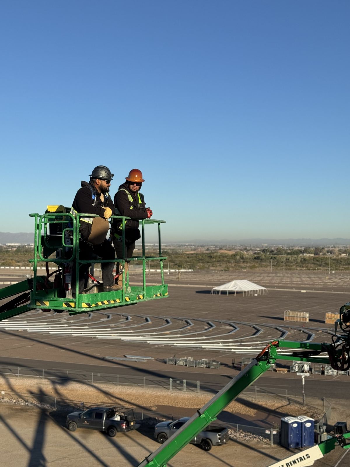 Crew members working from a boom lift