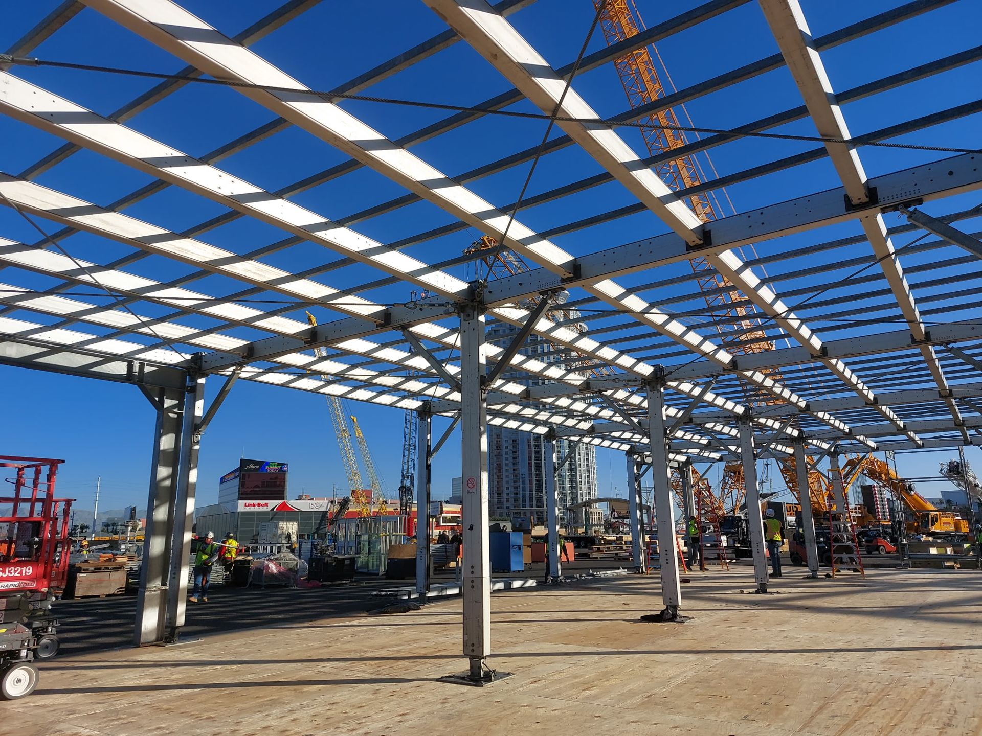 Steel frame structure going up with lifts