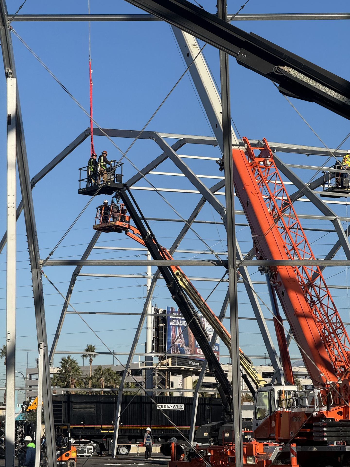 Operators on boom lifts during frame installation