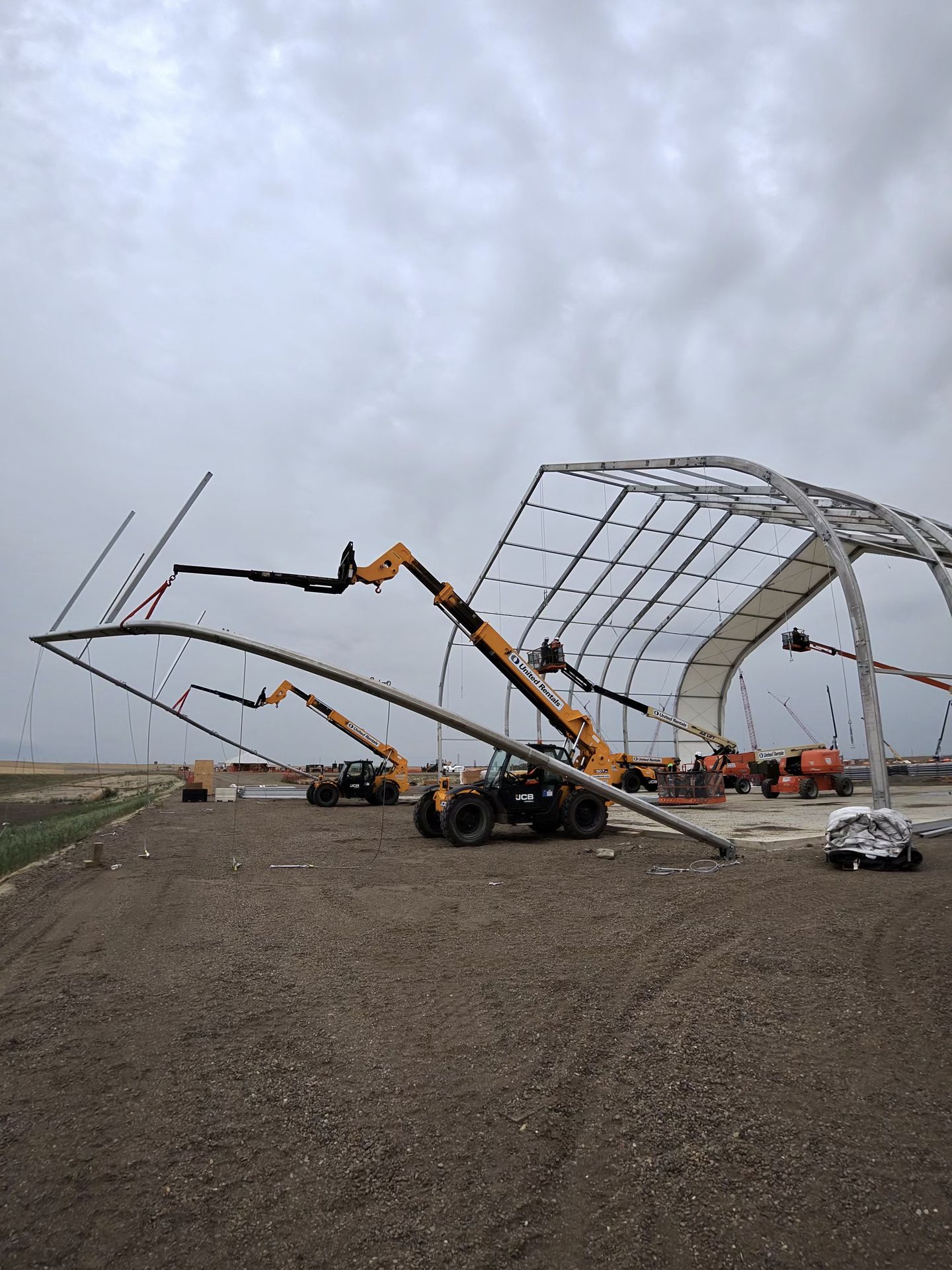 Crew member operating equipment on site